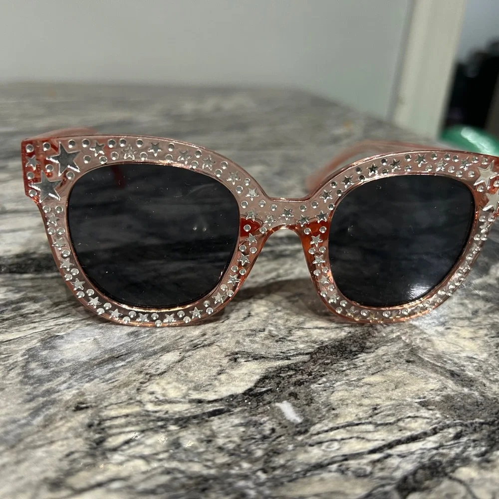 Stylish Pink Sunglasses with Star Accents